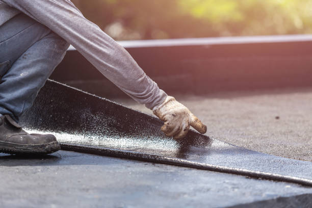 Professional Basement Waterproofing technician working in Bayville, NJ
